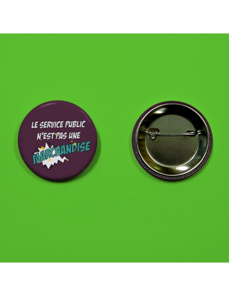 Badge Le service public n'est pas une marchandise