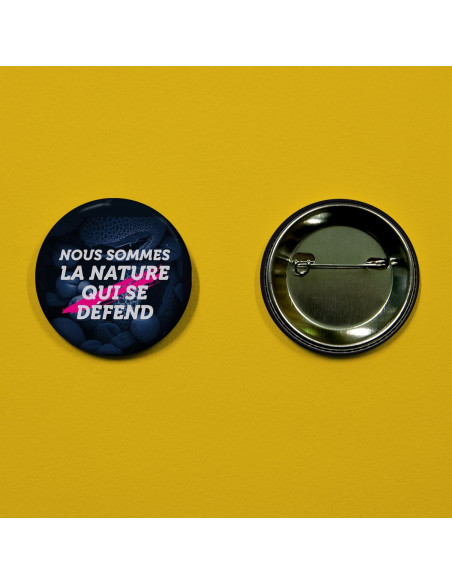 Badge nous sommes la nature qui se défend