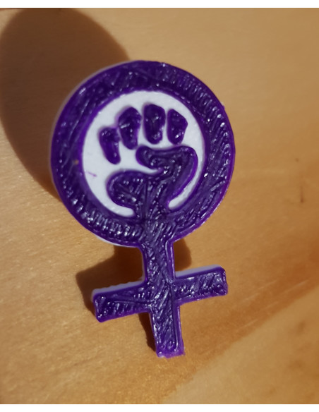 Le poing féministe (pin's violet)