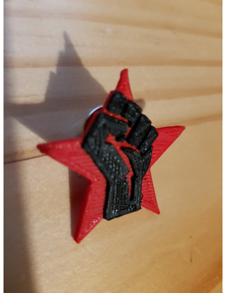 Poing noir étoile rouge (symbole de la révolution sociale et libertaire, rouge et noire)