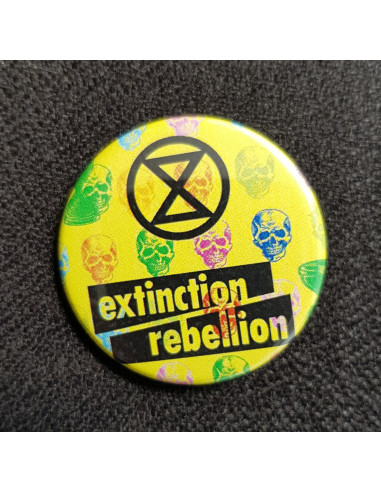 Badge Extinction Rebellion têtes de mort