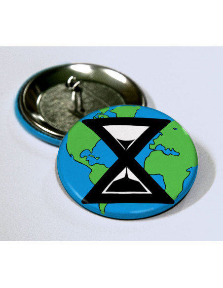 Badge Extinction Rebellion (XR) la Terre et le sablier vert bleu noir