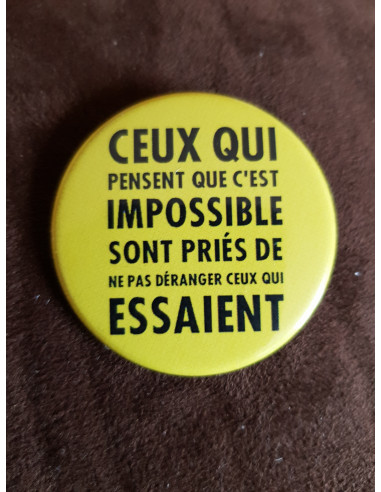 Badge Ceux qui pensent que c'est impossible sont priés de ne pas déranger ceux qui essaient